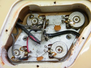 Real Gibson electronics cavity with upgraded electronics and braided wiring